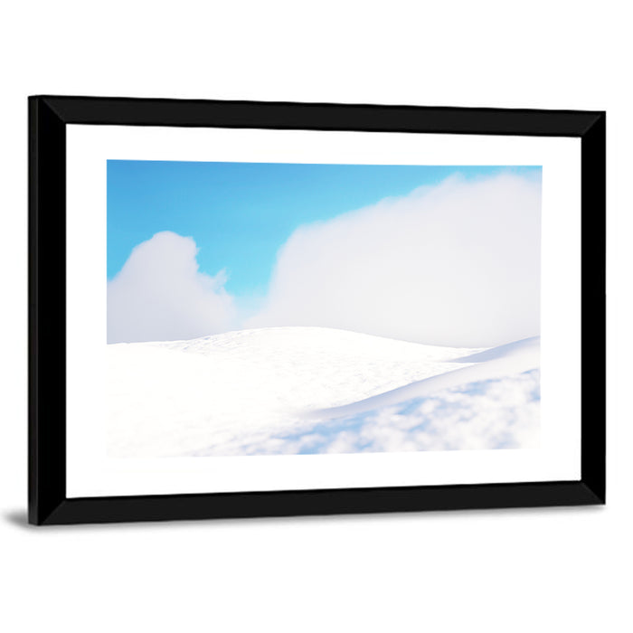 Snowy Hills Under Blue Sky Wall Art as a framed print