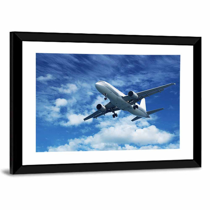 Passenger Airliner in Blue Sky Wall Art as a framed print