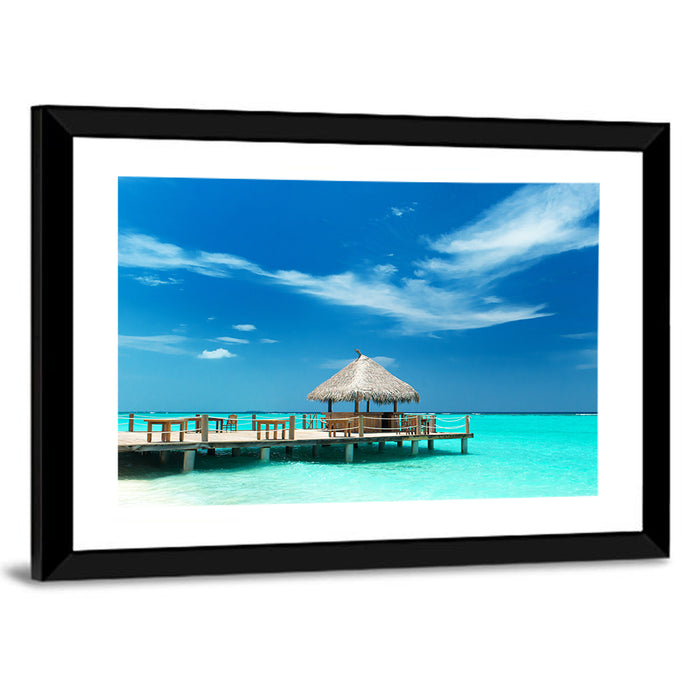 Thatched Beach Bar Pier Wall Art as a framed print