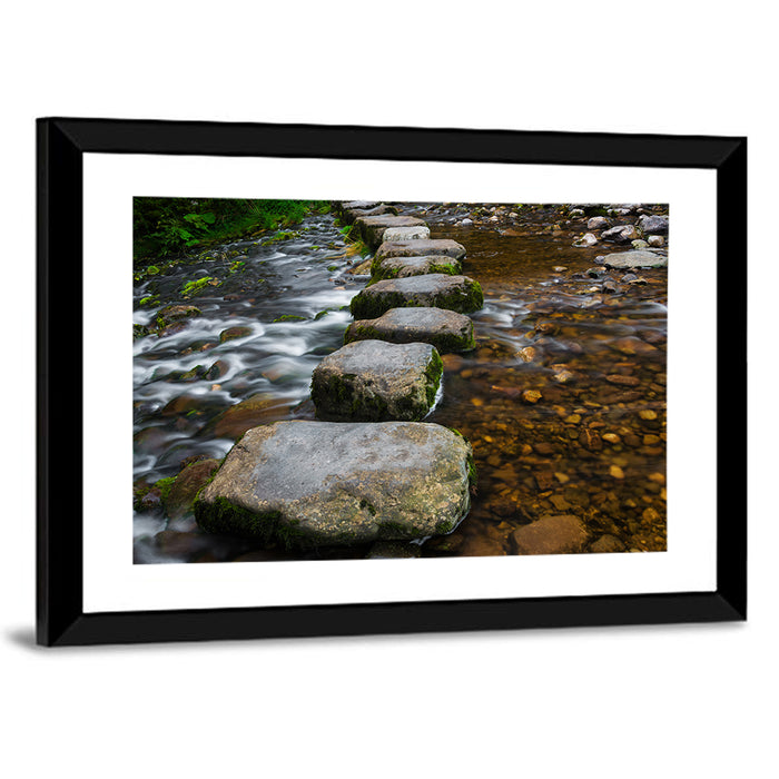 Mossy Stepping Stones Over Stream Wall Art as a framed print