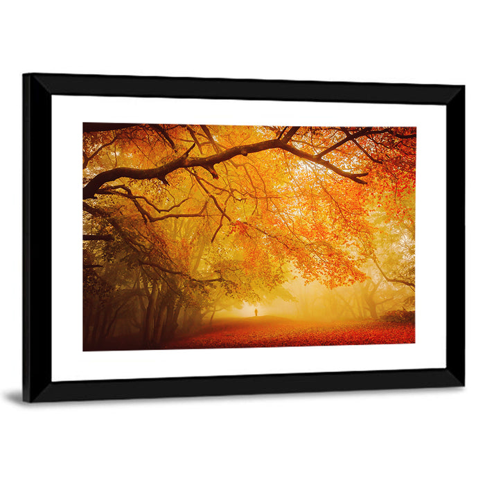 Autumn Forest Path with Lone Figure Wall Art as a framed print