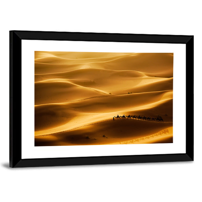Golden Hour Camel Caravan Wall Art as a framed print