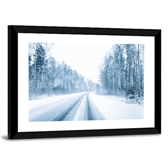 Tire Tracks on Snowy Road Wall Art as a framed print