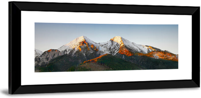 Sunlit Snow Capped Peaks Wall Art as a framed print