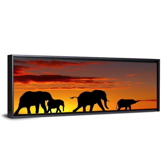 Elephant Herd at Sunset Wall Art as a framed canvas