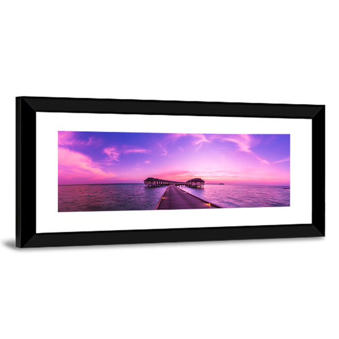 Sunset Pier Overwater Bungalows Wall Art as a framed print
