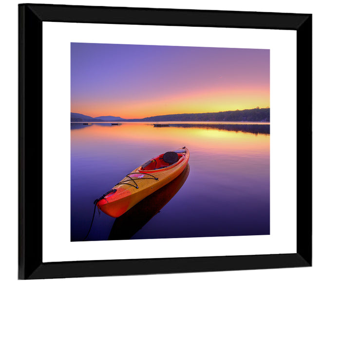 Bright Orange Kayak at Sunset Wall Art as a framed print