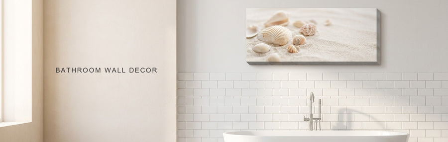 Bathroom wall decor in a bright bathroom with a freestanding tub and white tile: a soft coastal seashell canvas on the wall