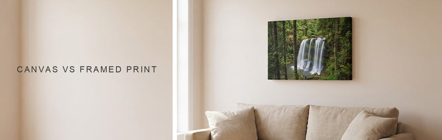 Canvas vs framed print: a forest waterfall canvas above a linen sofa in a bright living room