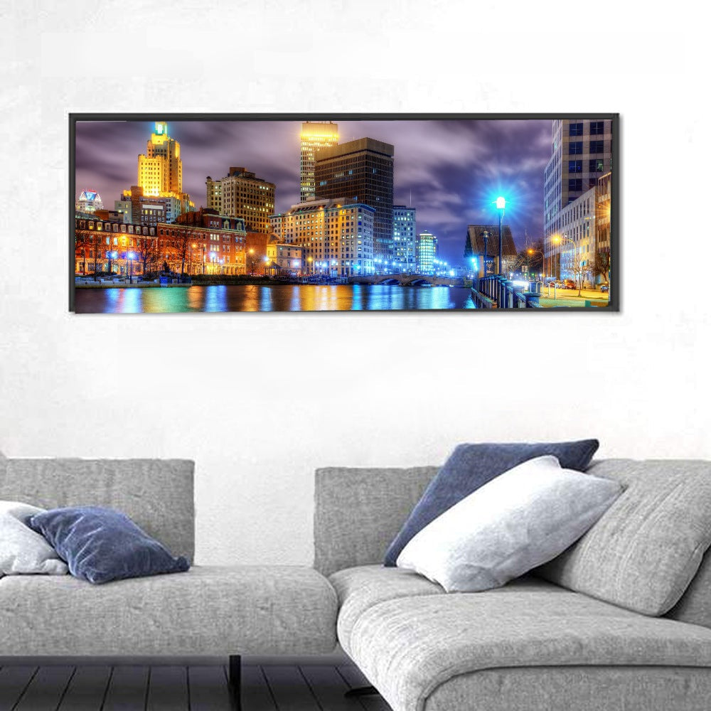 Providence River Night Skyline Wall Art in a room, panoramic