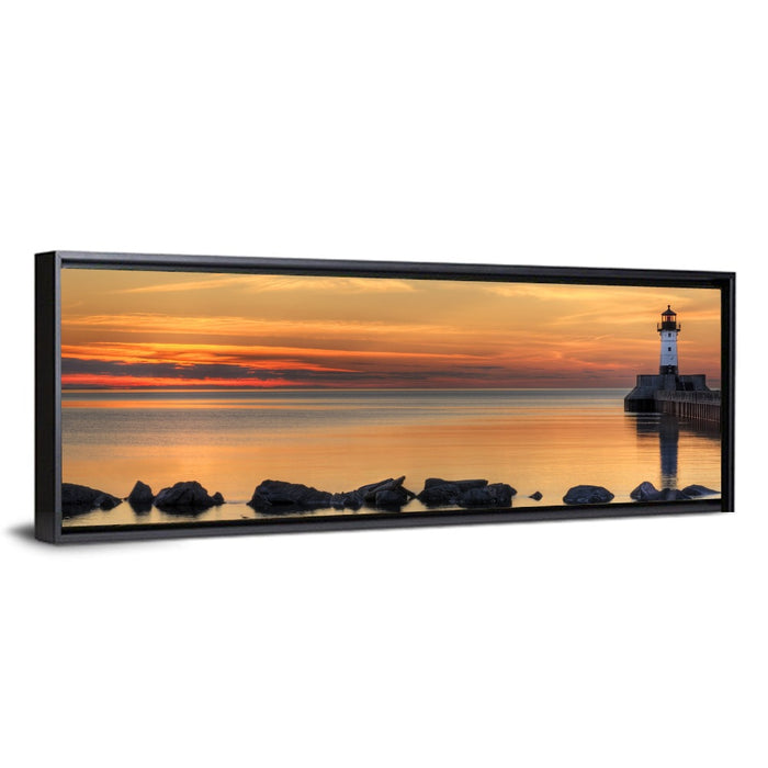 Duluth North Pier Lighthouse Sunset Wall Art as a framed canvas