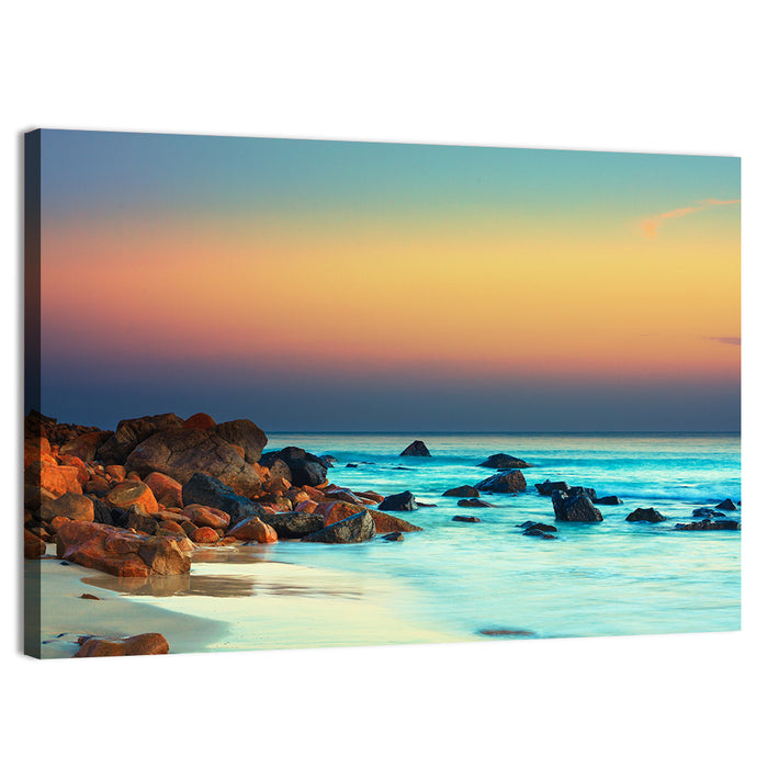 Sunset Over Volcanic Shoreline Wall Art as a canvas print