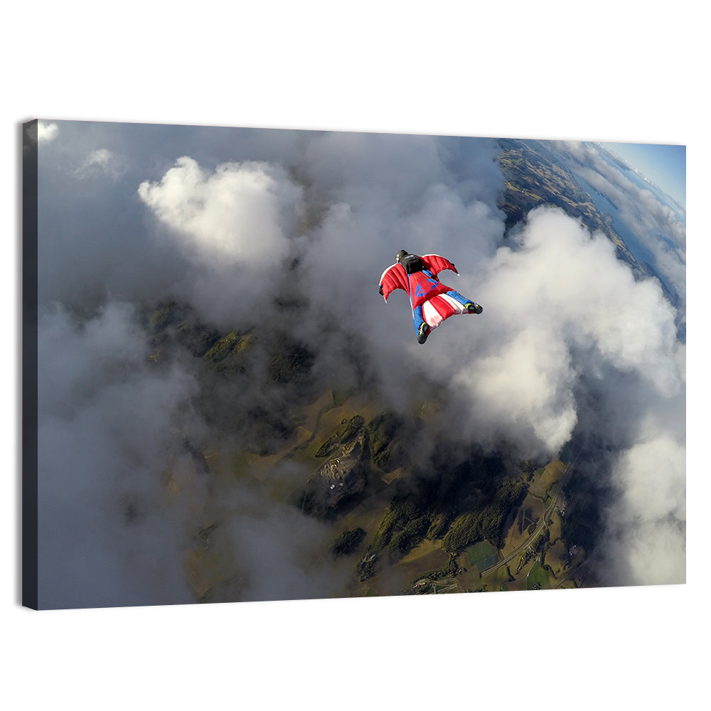Red Wingsuit Skydiver Over Clouds Wall Art, canvas print, landscape