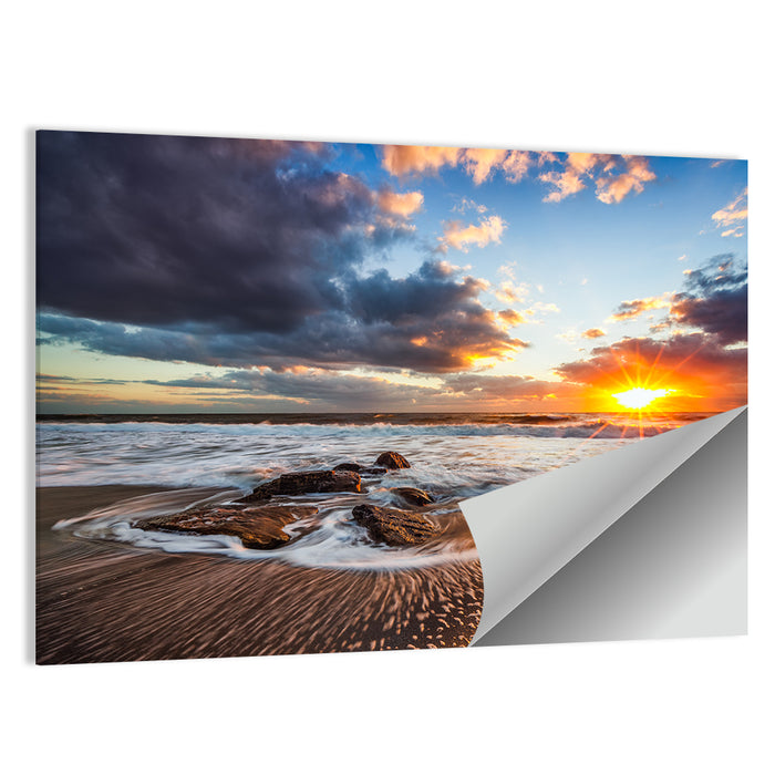Sunrise Over Rocky Shore Wall Art as a poster print