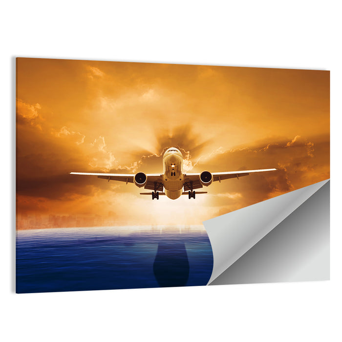 Landing Jet Over Ocean at Sunset Wall Art as a poster print