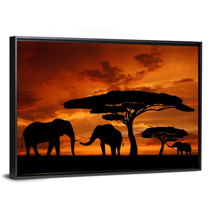 Three Elephants at Sunset Wall Art as a framed canvas