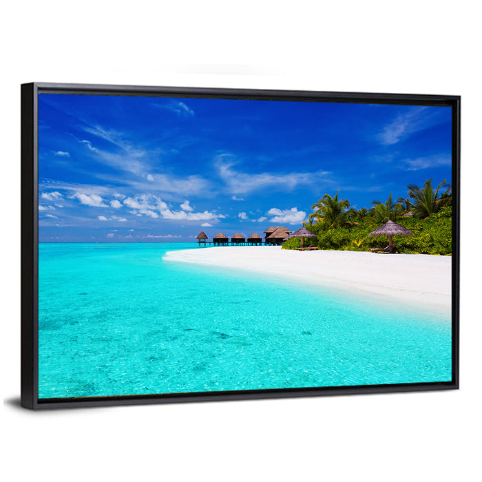 Turquoise Island with Water Bungalows Wall Art as a framed canvas