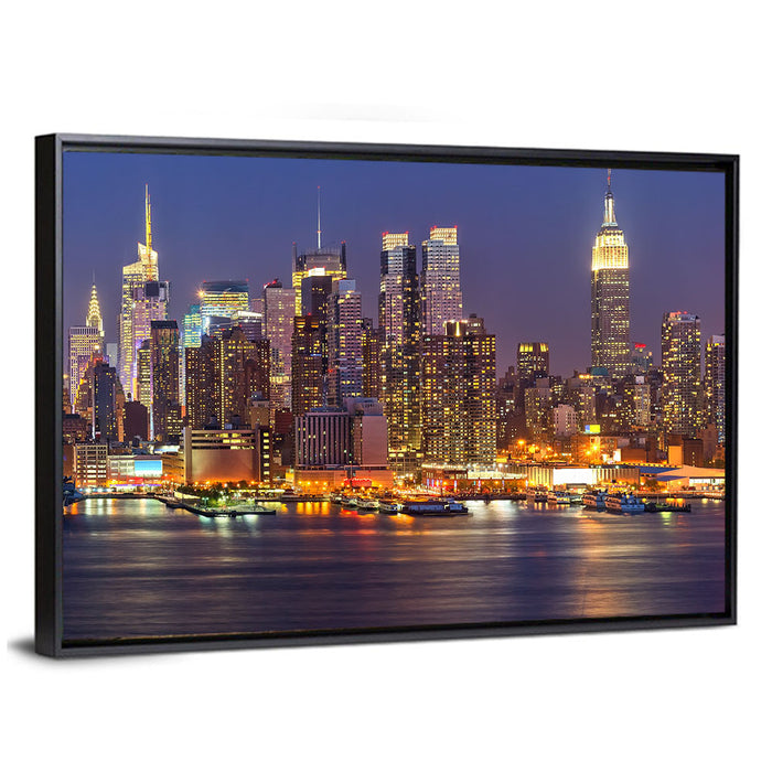 Manhattan at Night Wall Art as a framed canvas