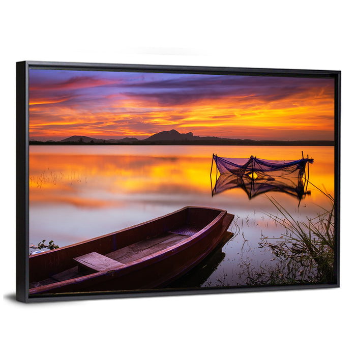 Boat Near Fishing Net at Sunset Wall Art as a framed canvas