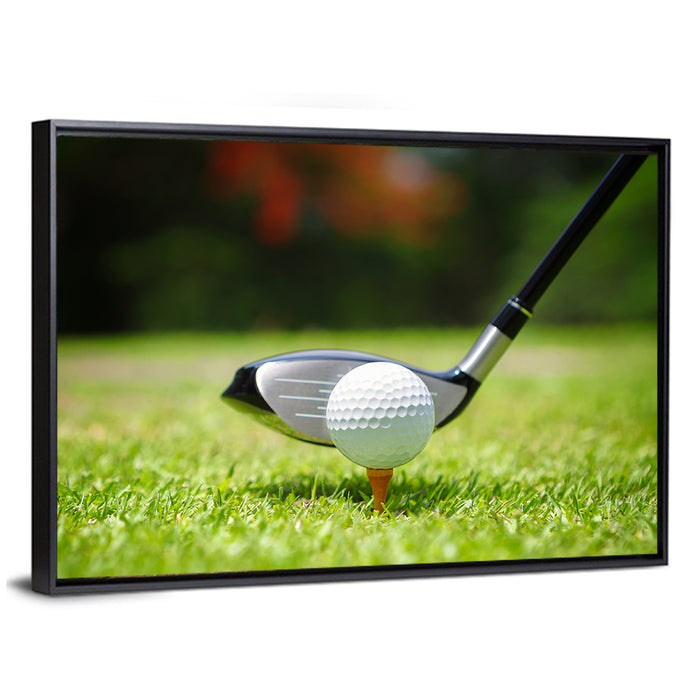 Golf Ball with Driver on Tee Wall Art as a framed canvas