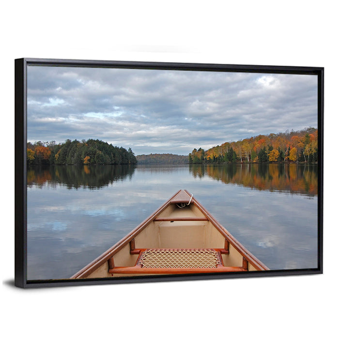 Overcast Canoe Bow on Autumn Lake Wall Art as a framed canvas