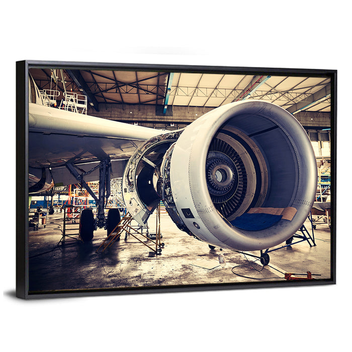 Open Jet Engine in Hangar Wall Art as a framed canvas