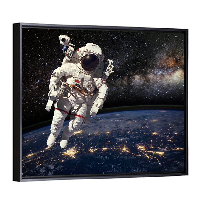 Astronaut Above Earth Horizon Wall Art as a framed canvas