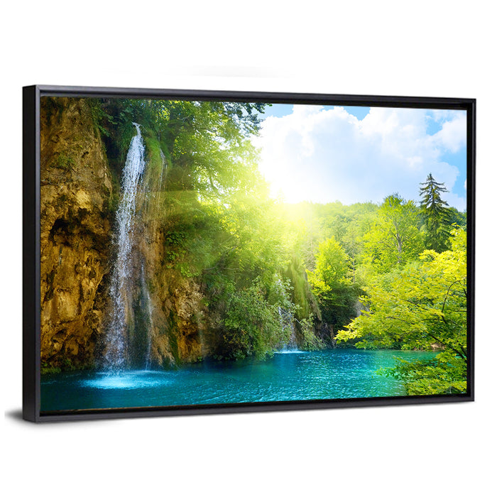 Forest Waterfall at Sunlit Lake Wall Art as a framed canvas