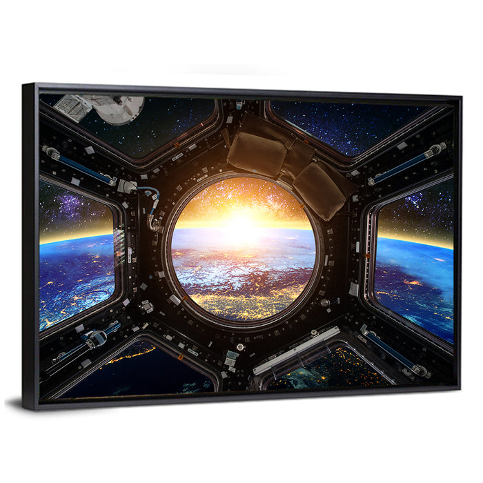 Earthrise Through Spacecraft Window Wall Art as a framed canvas