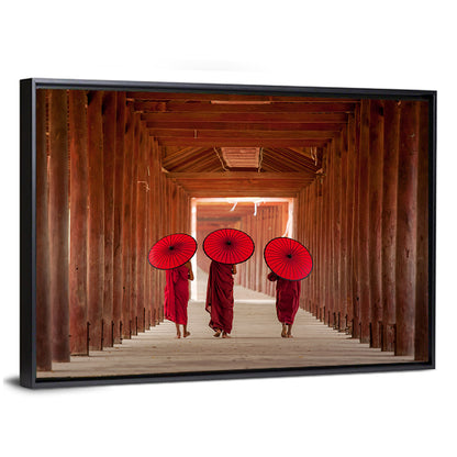 Novice Monks with Red Umbrellas Wall Art