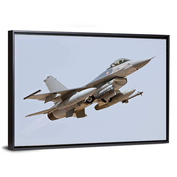 F-16 Fighter Jet Banking Over Sky Wall Art