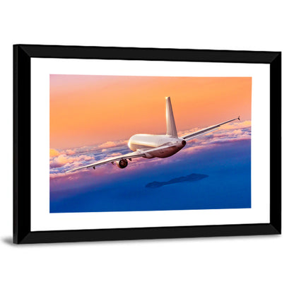 Airplane Over Clouds at Sunset Wall Art