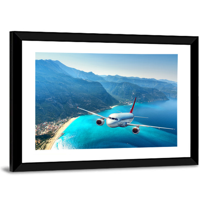 Airplane Over Turquoise Coast Wall Art as a framed print