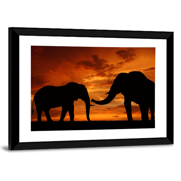 Elephants at Golden Sunset Wall Art as a framed print