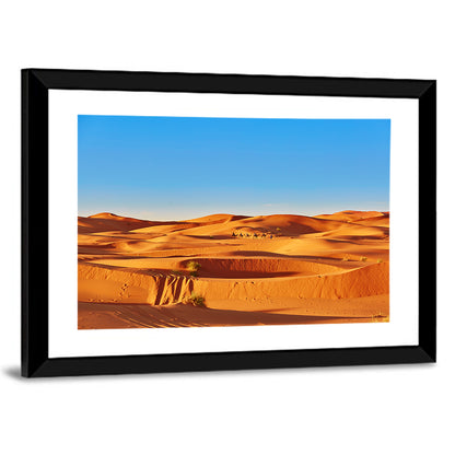 Sunlit Sahara Dunes with Camel Caravan Wall Art