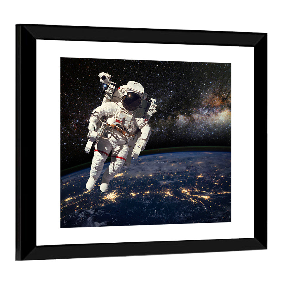 Astronaut In Outer Space Wall Art