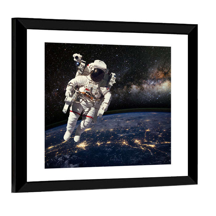 Astronaut Above Earth Horizon Wall Art as a framed print