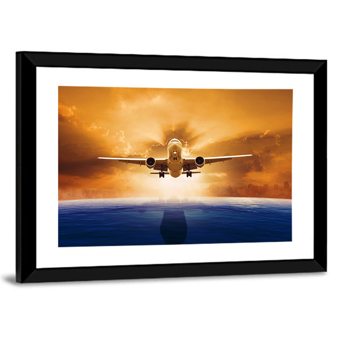 Landing Jet Over Ocean at Sunset Wall Art as a framed print