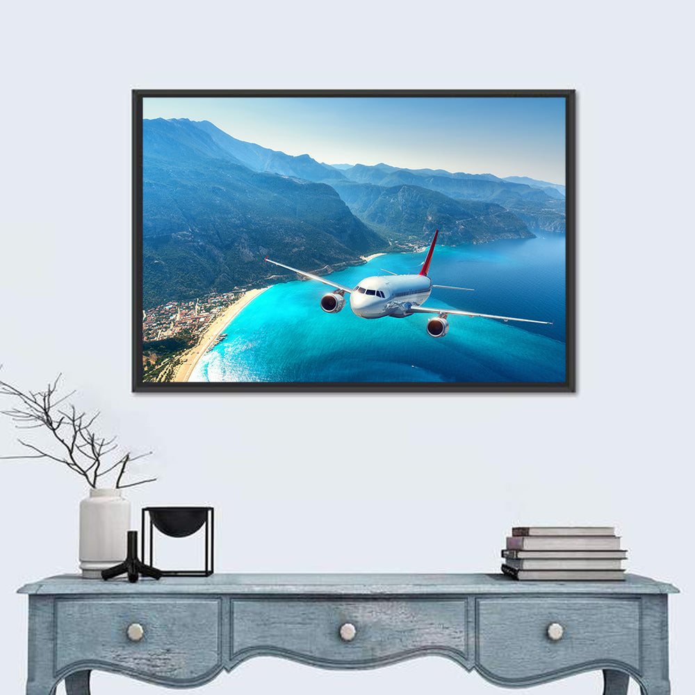 Airplane Over Turquoise Coast Wall Art in a room, landscape