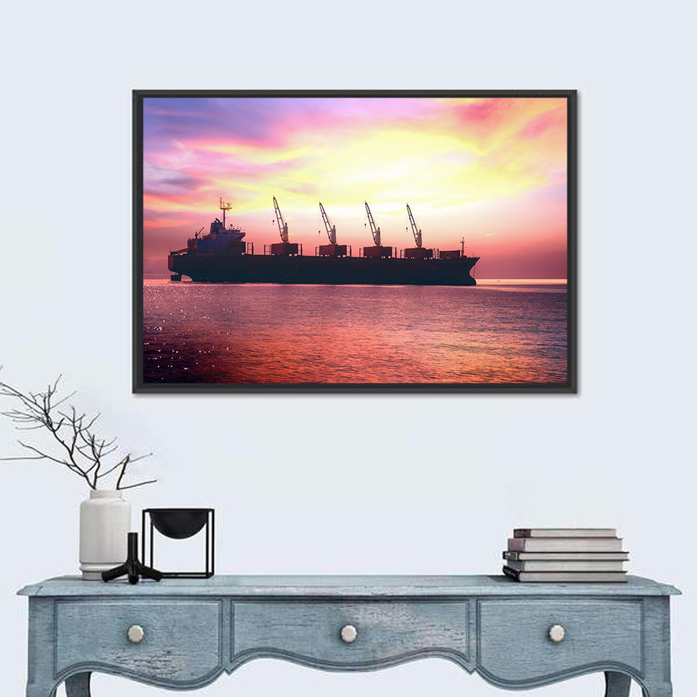 Sunset Cargo Ship Silhouette Wall Art in a room, landscape
