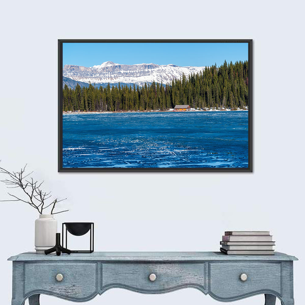 Boathouse on Frozen Lake Louise Wall Art in a room, landscape