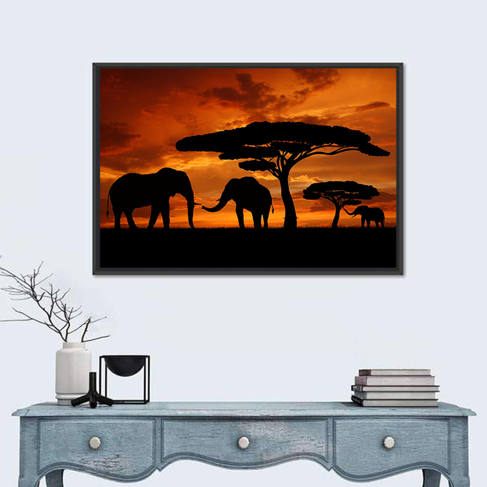 Three Elephants at Sunset Wall Art in a room, landscape