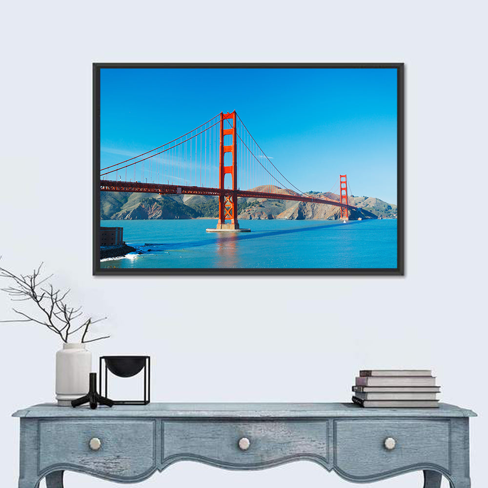 Golden Gate Bridge Under Blue Sky Wall Art in a room, landscape