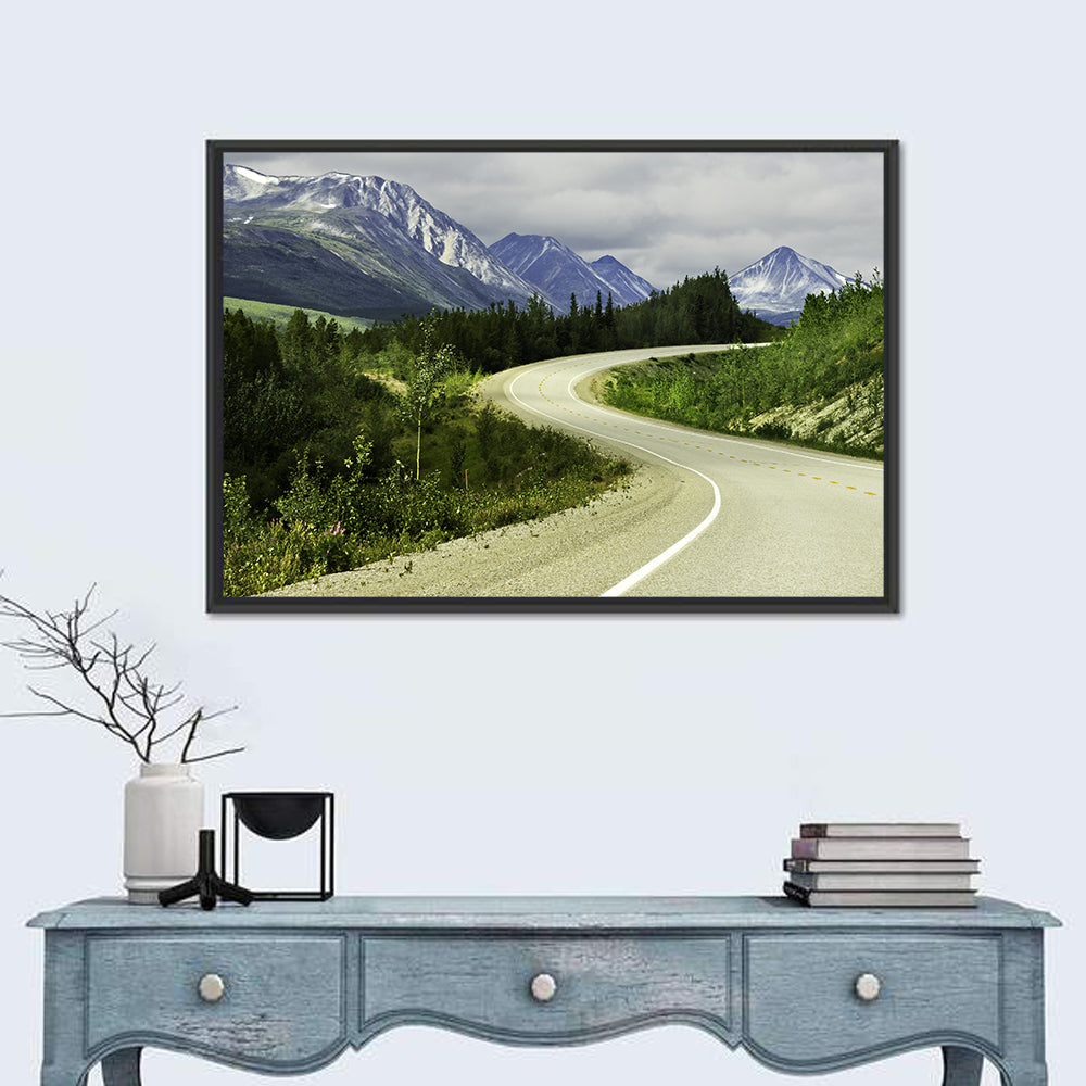 Winding Road to Snow Capped Alaskan Peaks Wall Art in a room, landscape
