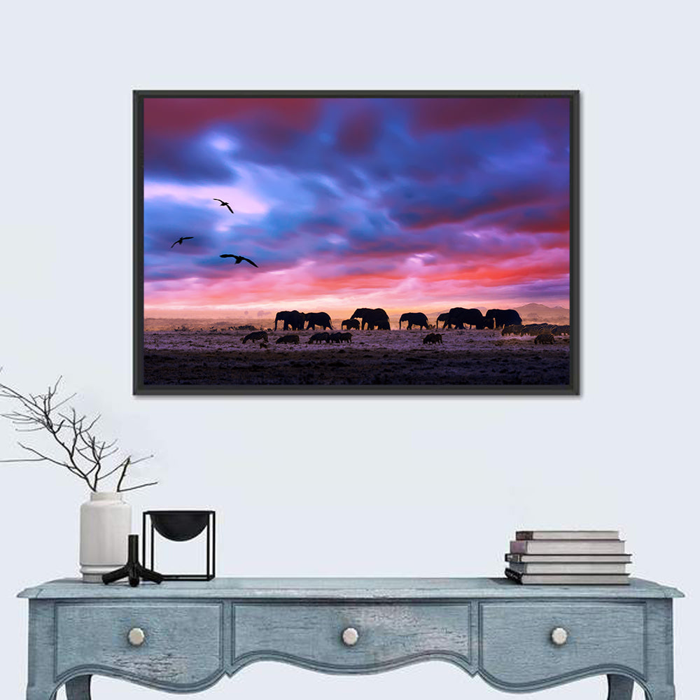 Elephants at Savannah Sunset Wall Art in a room, landscape