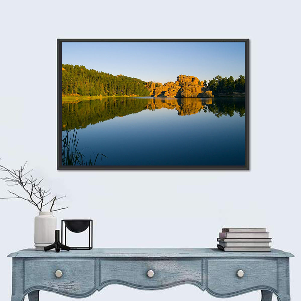 Sylvan Lake Golden Hour Reflection Wall Art in a room, landscape