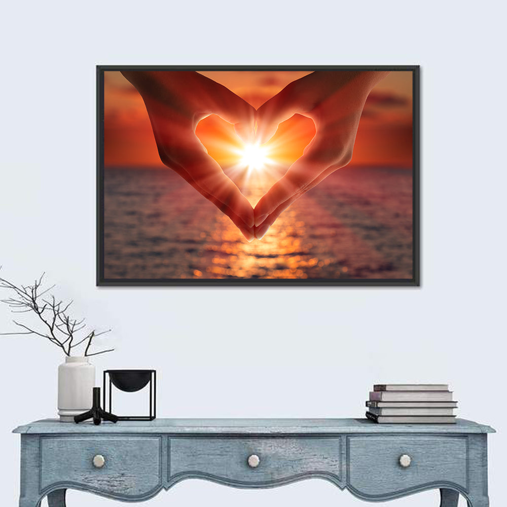 Hands Forming Heart at Sunset Wall Art