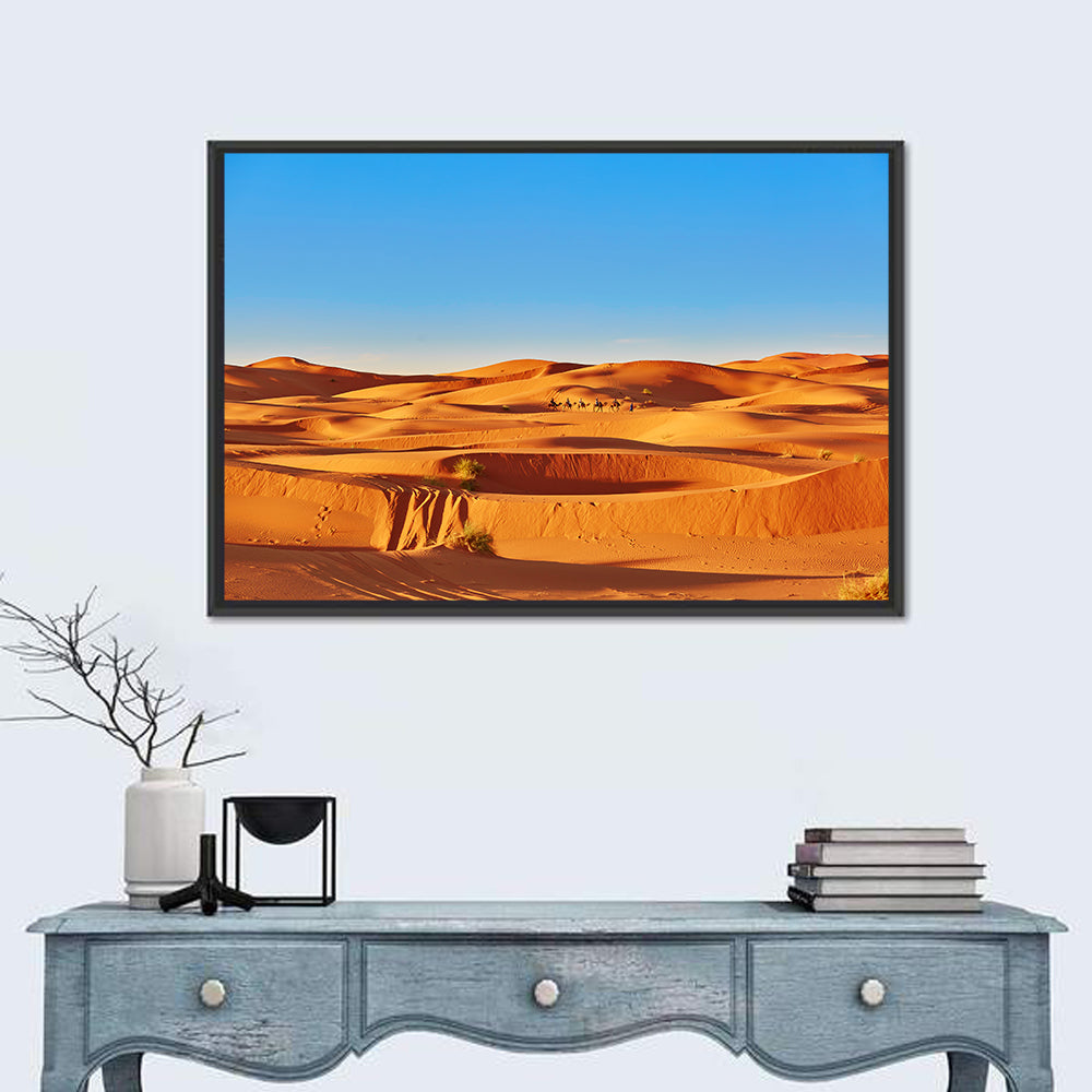 Sunlit Sahara Dunes with Camel Caravan Wall Art