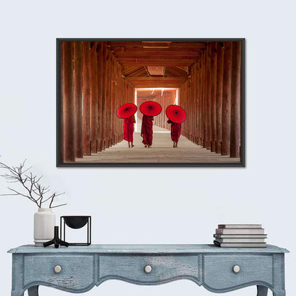 Novice Monks with Red Umbrellas Wall Art