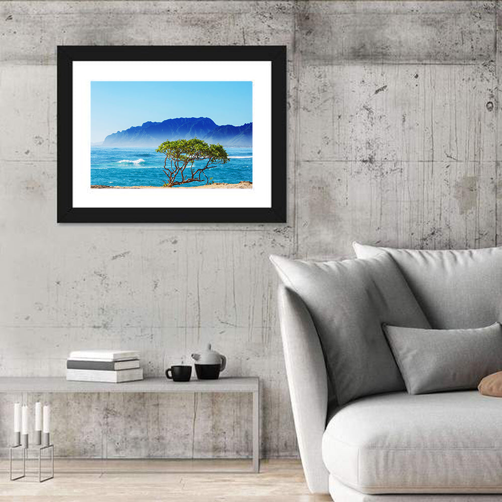 Hawaiian Coastal Tree on Rocky Shore Wall Art in a room, landscape
